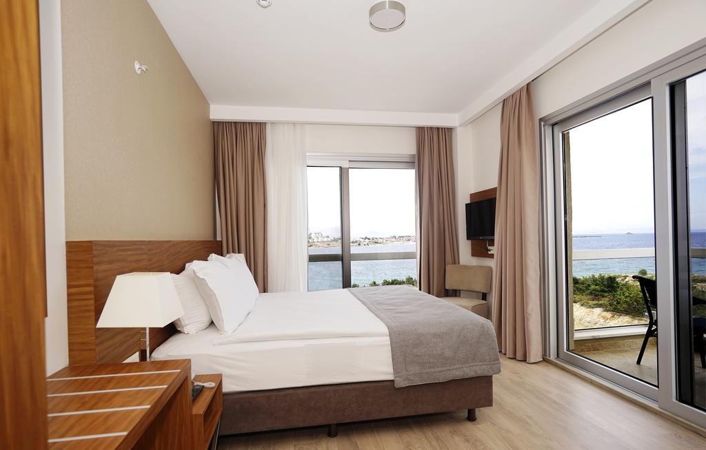 Casa De Playa Luxury Hotel And Beach Кешме Номер фото